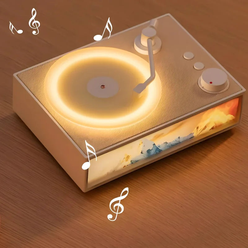 rotirajući disk uređaja sa muzičkim notama i dugmadima sa strane