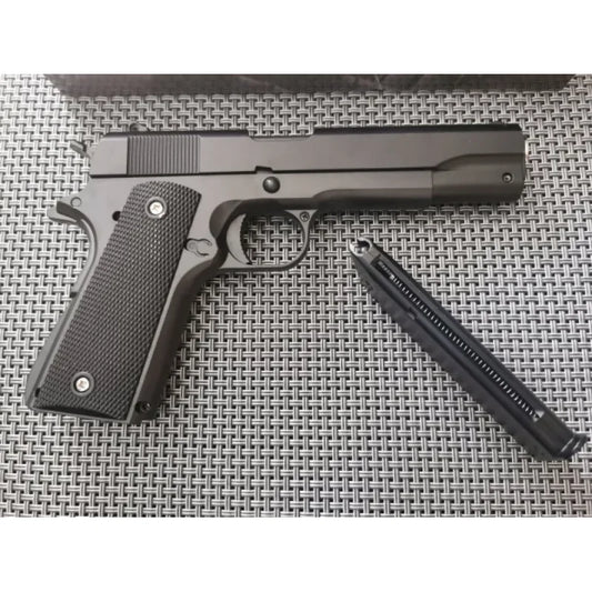 airsoft pištolj kolt 1911 — full metal replika sa crnim koricama