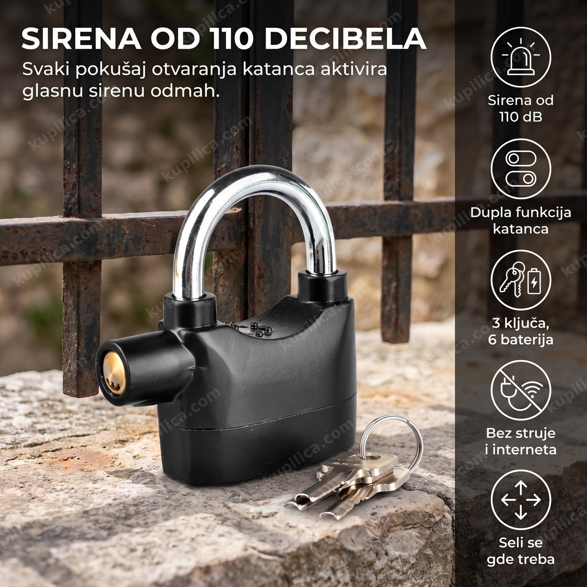 crni alarm katanac sa sirenom na kapiji, ključevi pored njega