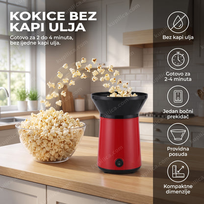 Aparat za kokice bez ulja na kuhinjskom pultu, kokice padaju u staklenu činiju