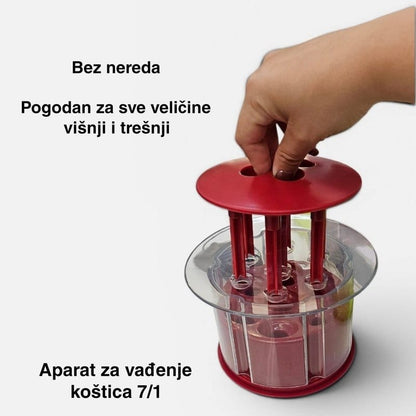 prst pritiska klip uređaja koji vadi košticu bez pravljenja nereda