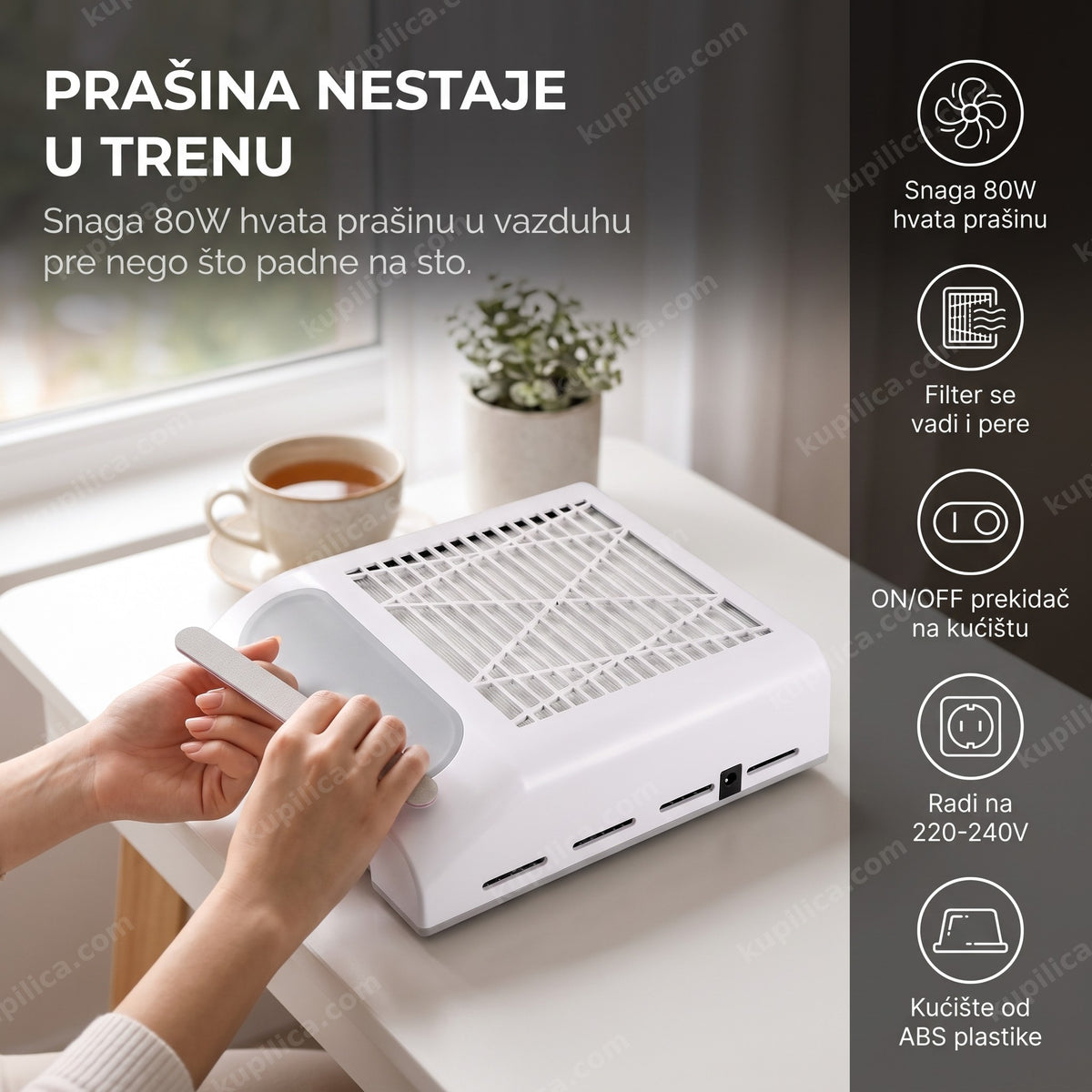 Beli aspirator za nokte pored prozora u kućnom manikir kutku sa prirodnim svetlom