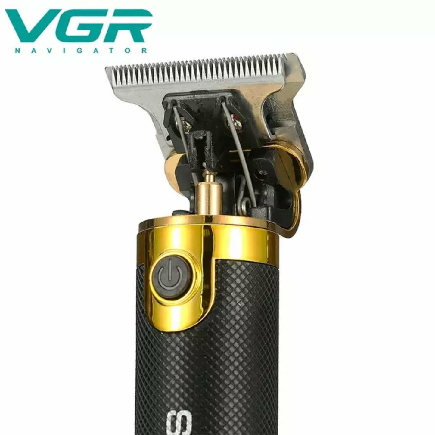 trimer za šišanje VGR V-082 sa nastavcima i USB kablom na stolu