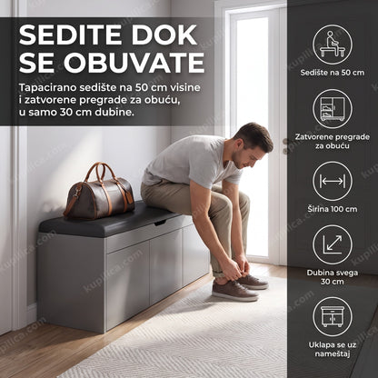 cipelarnik sa sedištem siva — muškarac sedi na sivom cipelarniku i obuva cipele u hodniku, sedište na 50 cm, zatvorene pregrade za obuću, uklapa se uz nameštaj