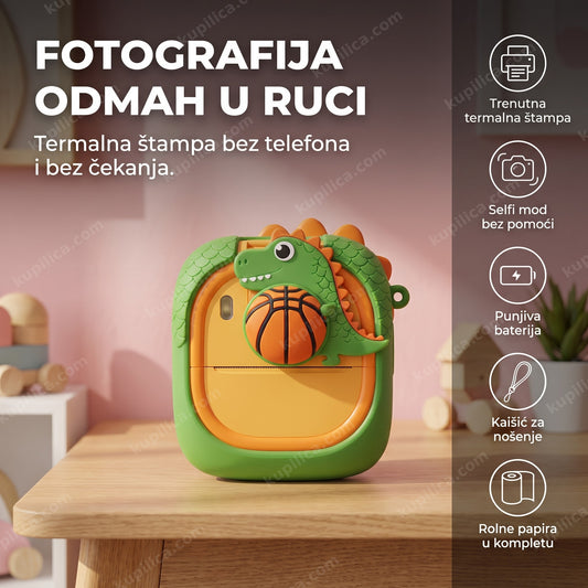 zeleni dečiji fotoaparat sa štampačem u obliku dinosaurusa na stolu