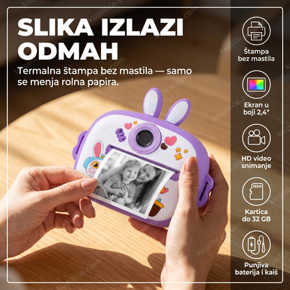 dečiji fotoaparat sa štampačem zeka ljubičasti — ruke drže fotoaparat dok izlazi odštampana slika, benefiti proizvoda