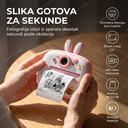 dečiji fotoaparat sa štampačem zeka roze — ruke drže odštampanu sliku pored roze fotoaparata, benefiti proizvoda
