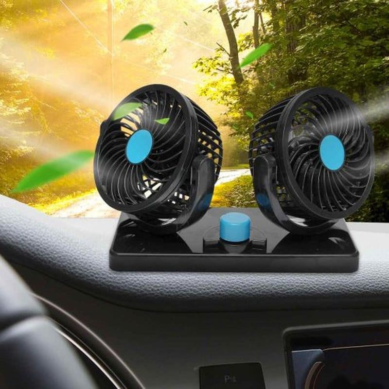 dupli ventilator na tabli automobila uz šumski put obasjan suncem