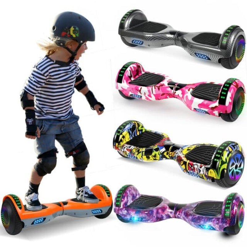 hoverboard 6.5 inča — dete u zaštitnoj opremi vozi narandžasti model, pored šarenih varijanti