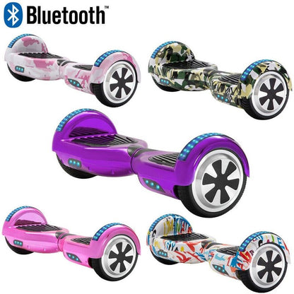 ljubičasti hoverboard sa bluetooth zvučnikom, pored roze, kamuflažnog i šarenih modela