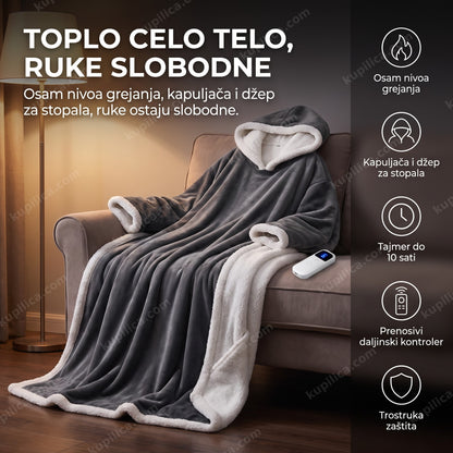 sivo grejno ćebe sa kapuljačom i rukavima prebačeno preko fotelje uveče