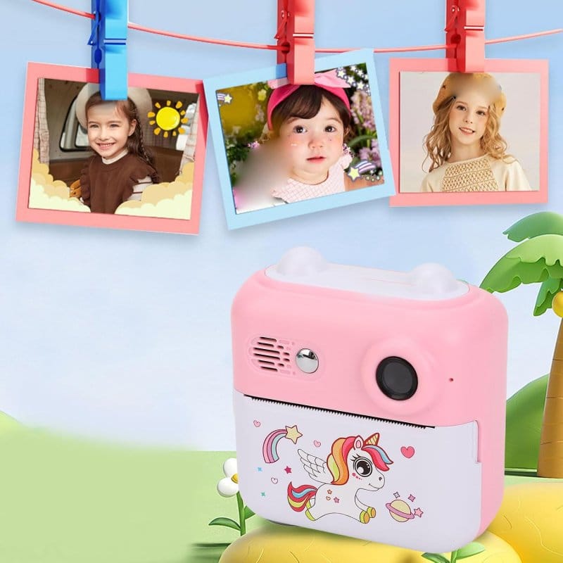 kamera sa priborom za bojenje i albumom za fotografije