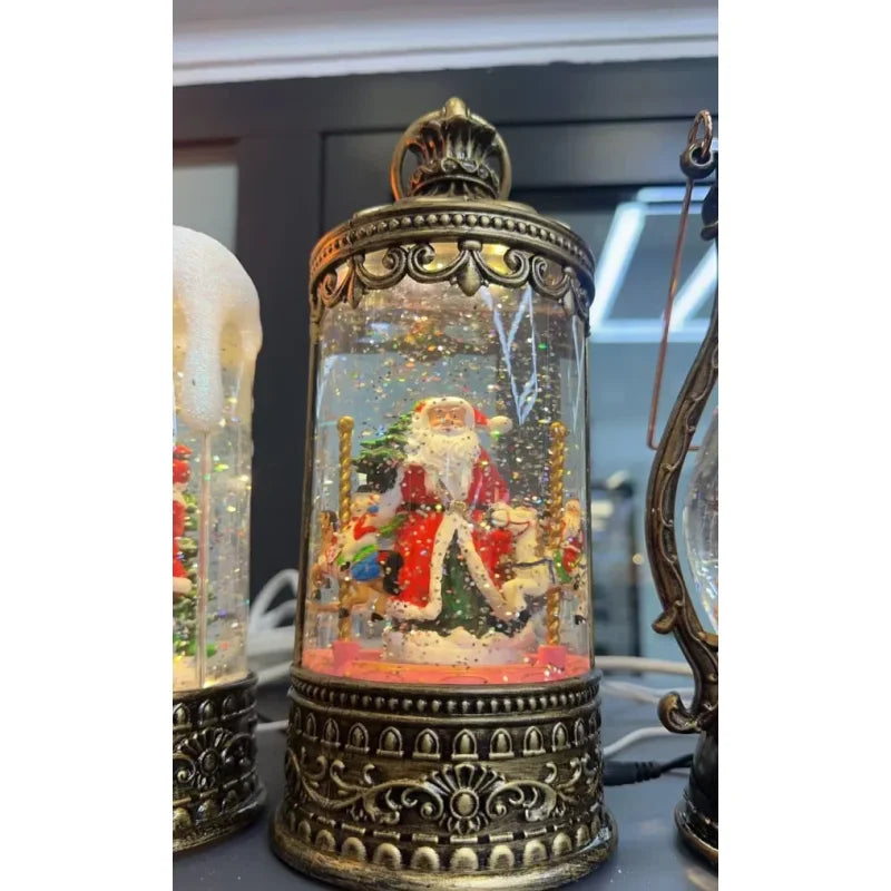 lampa sa Deda Mrazom — providni valjak sa šljokicama, metalni krović i bronzano postolje