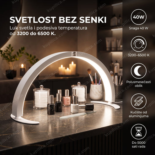 Bela LED lampa za manikir u obliku polumeseca sa priborom na stolu