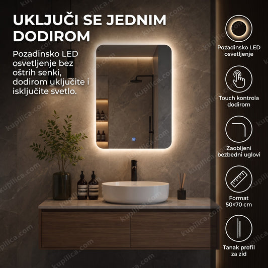 pravougaono LED ogledalo za kupatilo sa osvetljenjem iznad umivaonika uveče