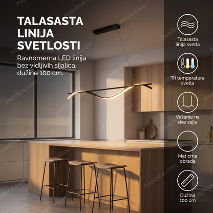 Crni talasasti linijski luster iznad kuhinjskog ostrva u minimalističkoj kuhinji