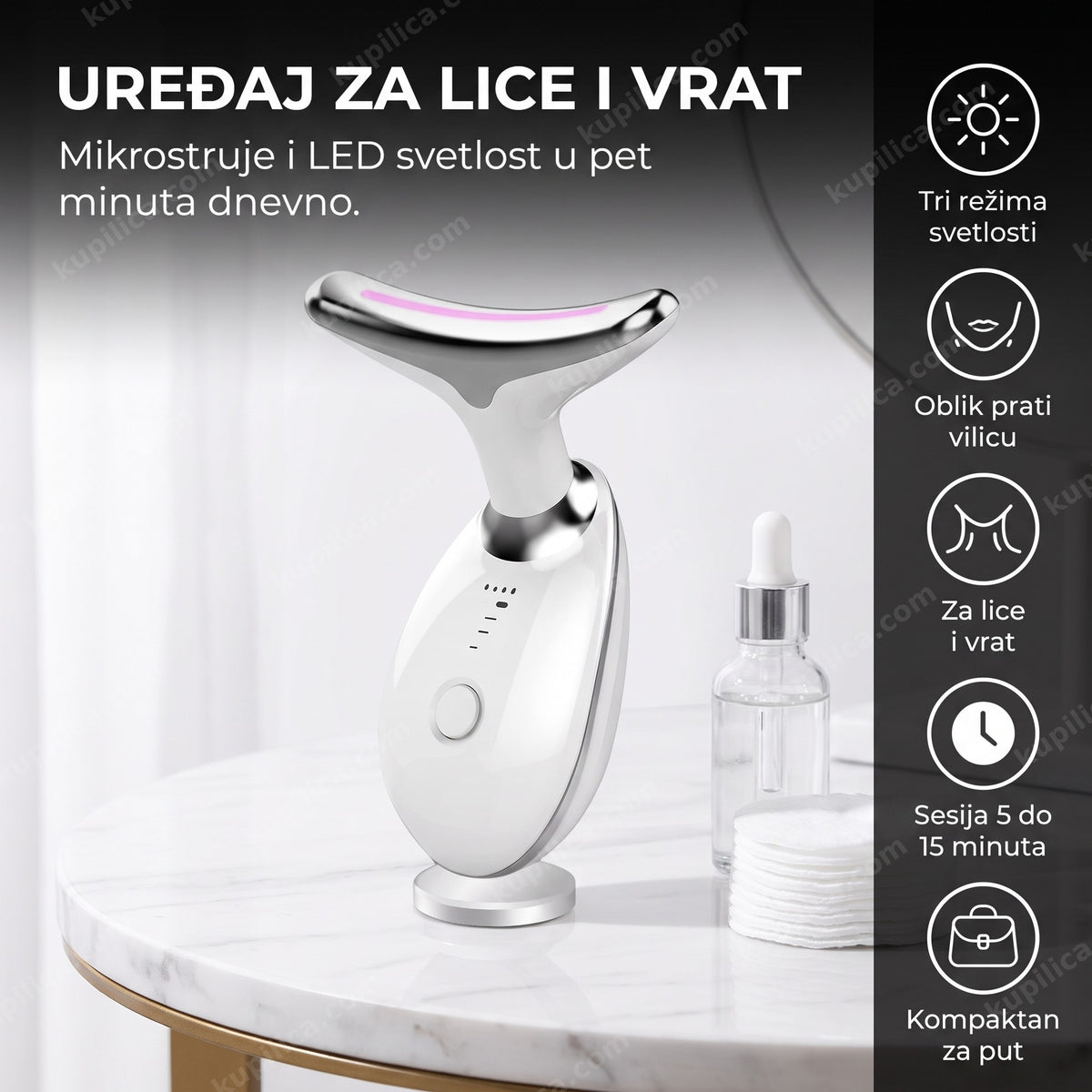 beli ems masažer za lice i vrat na kozmetičkom stočiću bez natpisa