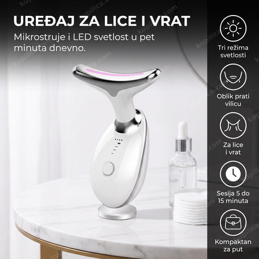 beli ems masažer za lice i vrat na kozmetičkom stočiću bez natpisa