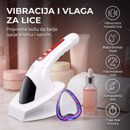 masažer za lice sa vibracijom na mermernom kozmetičkom stočiću