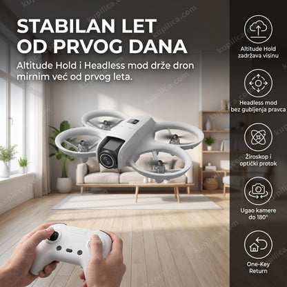 Mini dron sa kamerom lebdi u dnevnoj sobi, daljinski upravljač u prvom planu