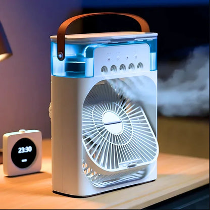 mini klima 5u1 vodena magla i difuzer na stolu uveče ispušta paru