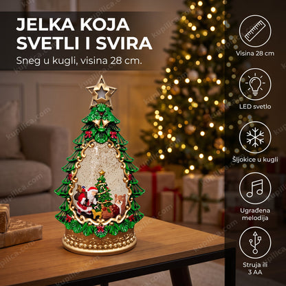 muzička novogodišnja jelka sa snegom i led svetlom na stolu kraj jelke