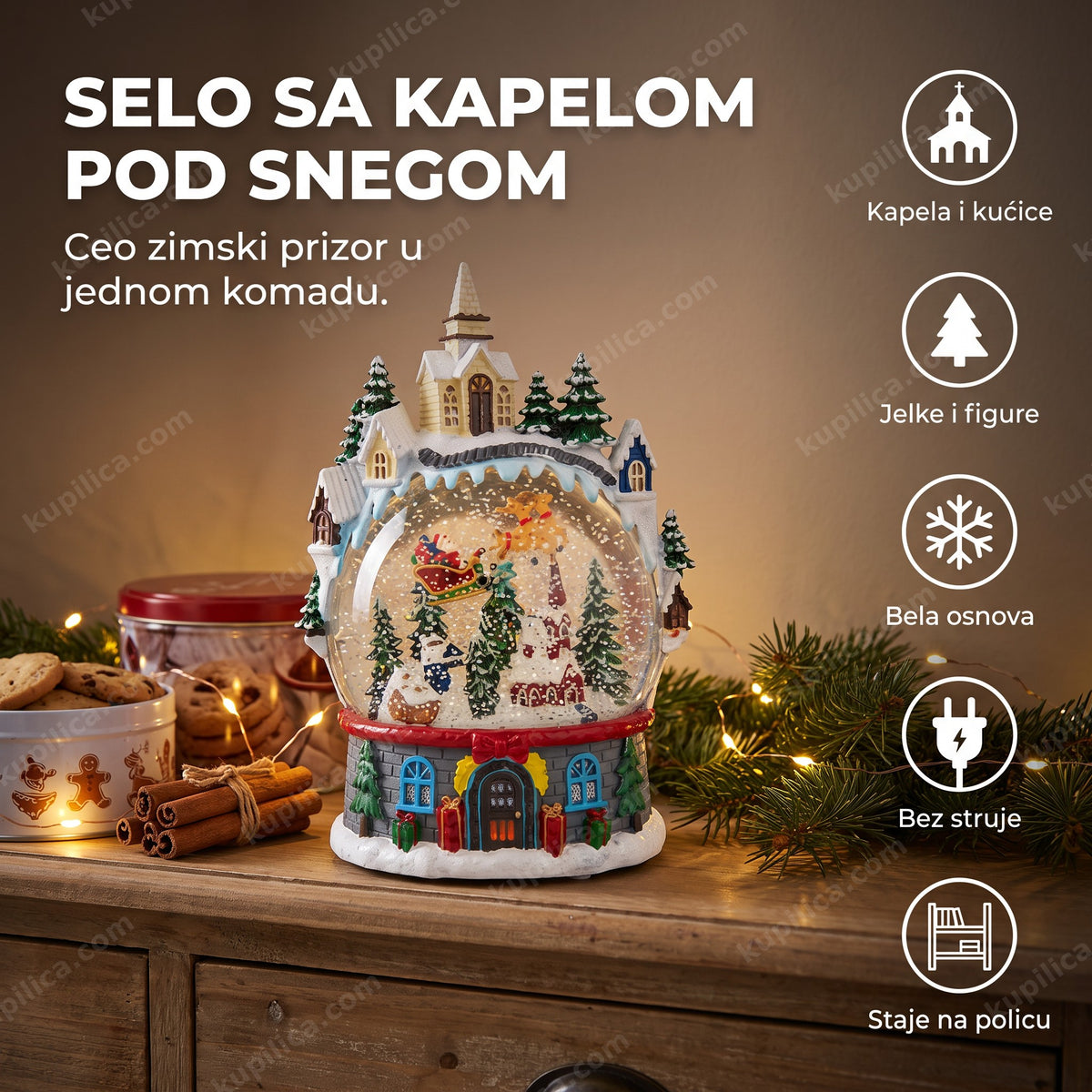 novogodišnja snežna kugla sa kapelom i selom pod snegom na rustičnoj komodi