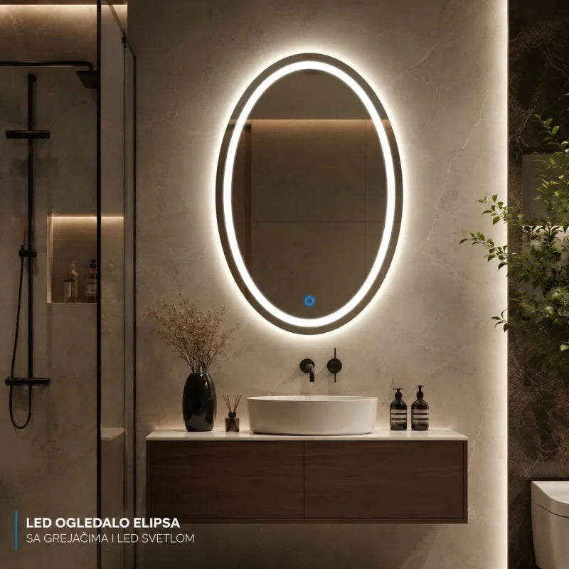 ovalno LED ogledalo sa grejačem iznad umivaonika u kupatilu sa tuš kabinom