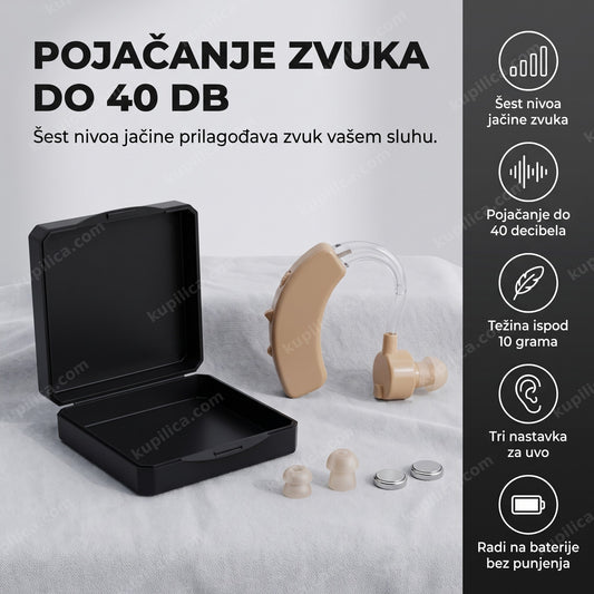 bež pojačivač zvuka za uši sa nastavcima i baterijama na stolu