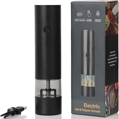 crni mlin za biber pored kutije sa natpisom electric salt and pepper grinder