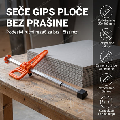 narandžasti rezač gipsanih ploča na radnom stolu bez ruku