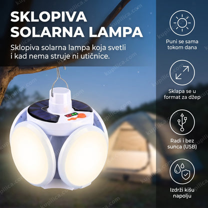 bela sklopiva solarna lampa upaljena u kampu uveče pored šatora, benefiti proizvoda