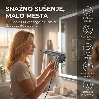 sklopivi fen za kosu VGR V-420 2000 W — žena suši kosu fenom sa sklopivom ručkom u kupatilu