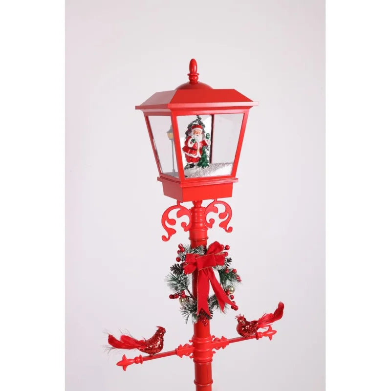dve crvene ptice na poprečnoj prečki dekorativne lampe