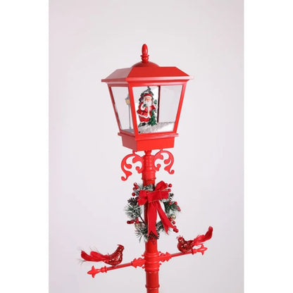 dve crvene ptice na poprečnoj prečki dekorativne lampe