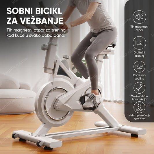 Odrasla osoba vozi sobni bicikl sa magnetnim otporom u dnevnoj sobi, benefiti bicikla