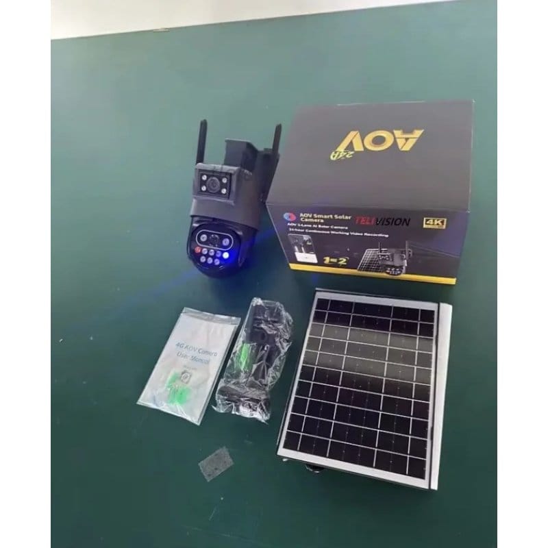 Kutija AOV kamere, kamera, solarni panel, nosač i uputstvo raspoređeni na stolu