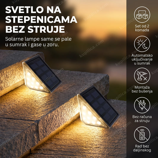 dve solarne lampe za stepenište osvetljavaju ivice spoljnih betonskih stepenica uveče