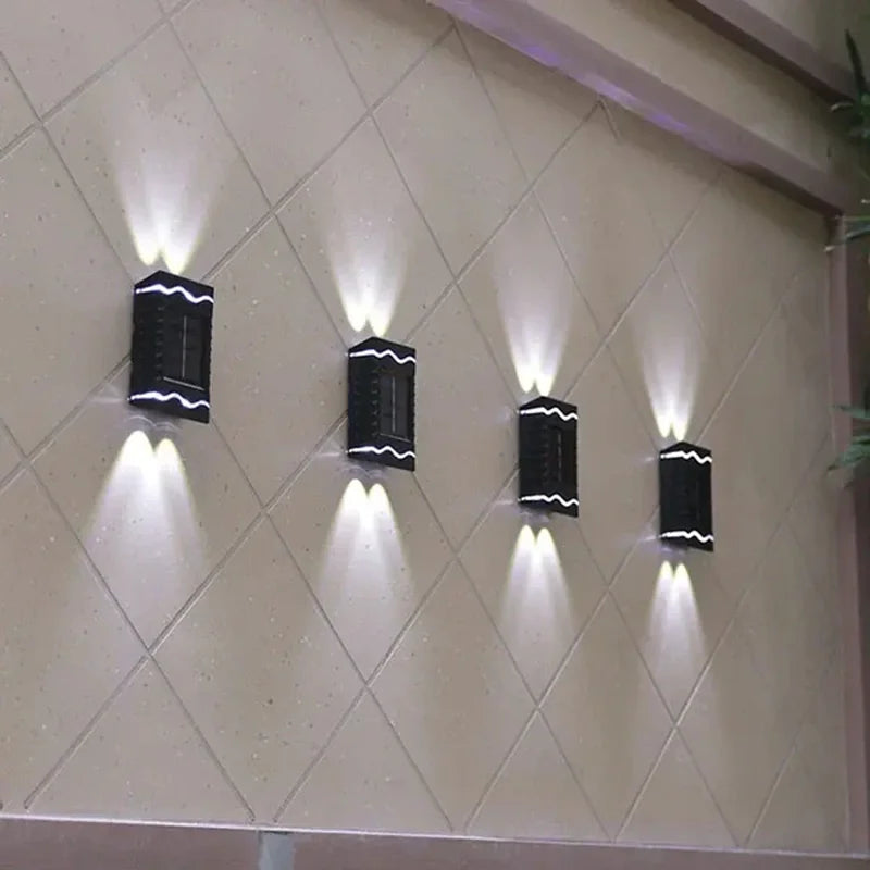 solarne zidne lampe za dvorište 4 komada — pregled