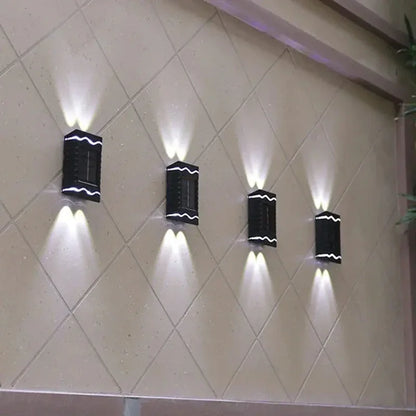 solarne zidne lampe za dvorište 4 komada — pregled