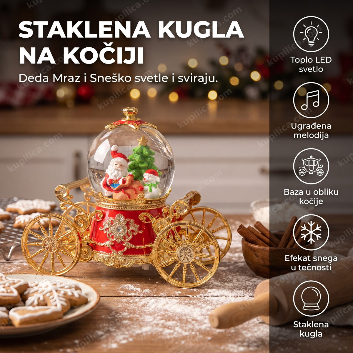 staklena kugla sa kočijom, deda mraz i sneško na stolu sa kolačima