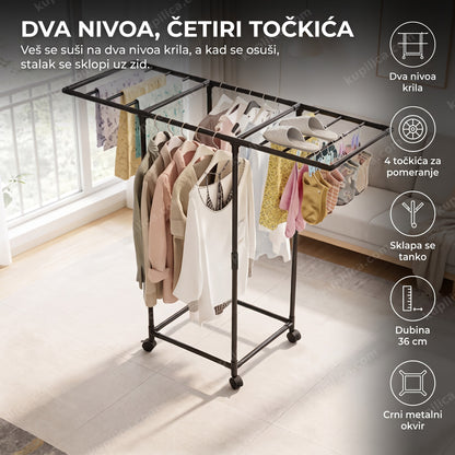 sklopivi metalni stalak za veš na točkićima u dnevnoj sobi
