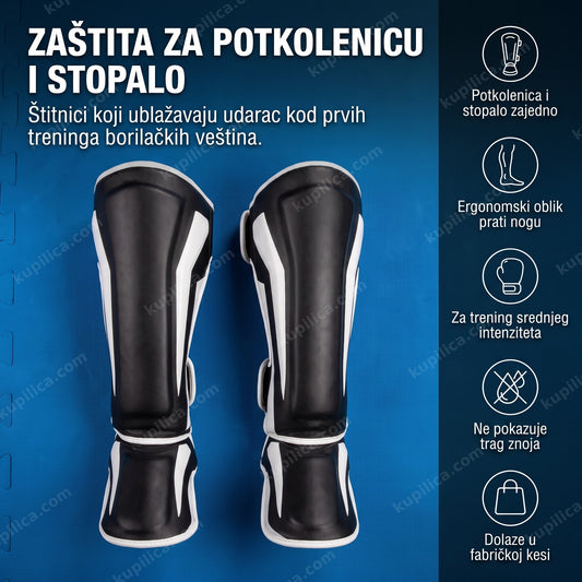 crni štitnici za potkolenice i stopala položeni na tatami podlogu