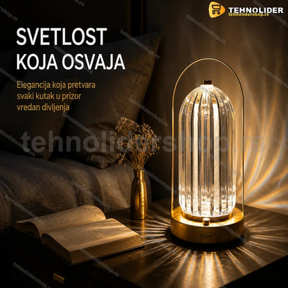 stona lampa fenjer sa staklenom kupolom na zlatnoj metalnoj osnovi