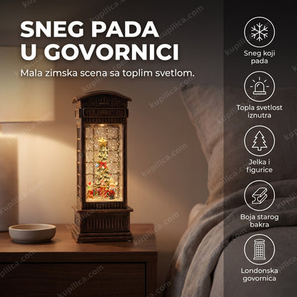 ukras telefonska govornica sa efektom snega i jelkom na noćnom ormariću u spavaćoj sobi