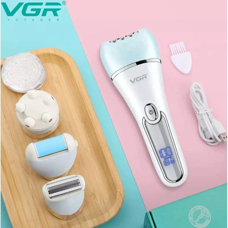 epilator VGR sa nastavcima za brijanje, piling i masažu na drvenoj podlozi