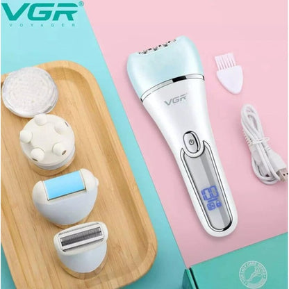 epilator VGR sa nastavcima za brijanje, piling i masažu na drvenoj podlozi