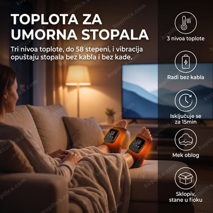 Osoba opušta stopala u vibracionom masažeru sa grejanjem uveče na kauču