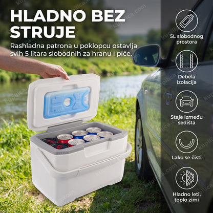 Prenosni ručni frižider Vilde Orion 5L otvoren pored automobila na putovanju