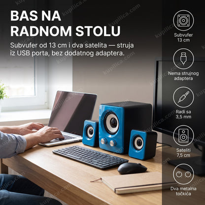 Osoba radi na laptopu pored zvučnika FT-202 sa subvuferom na stolu